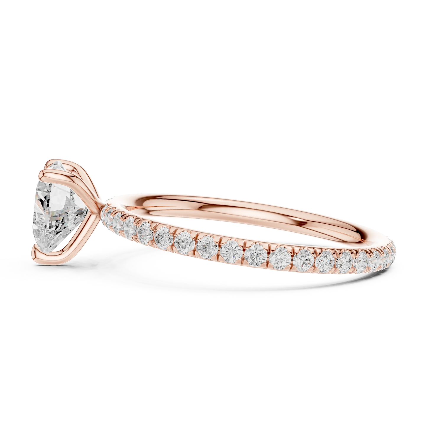 Side profile of rose gold heart shape solitaire ring with thin pavé diamond band and elevated center stone