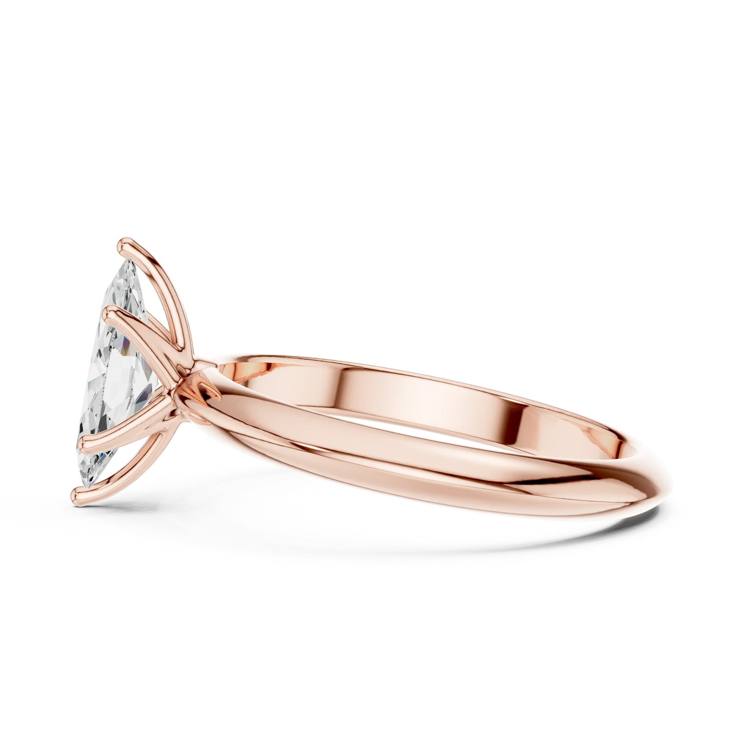 Side view of rose gold marquise cut diamond solitaire ring, highlighting design profile.