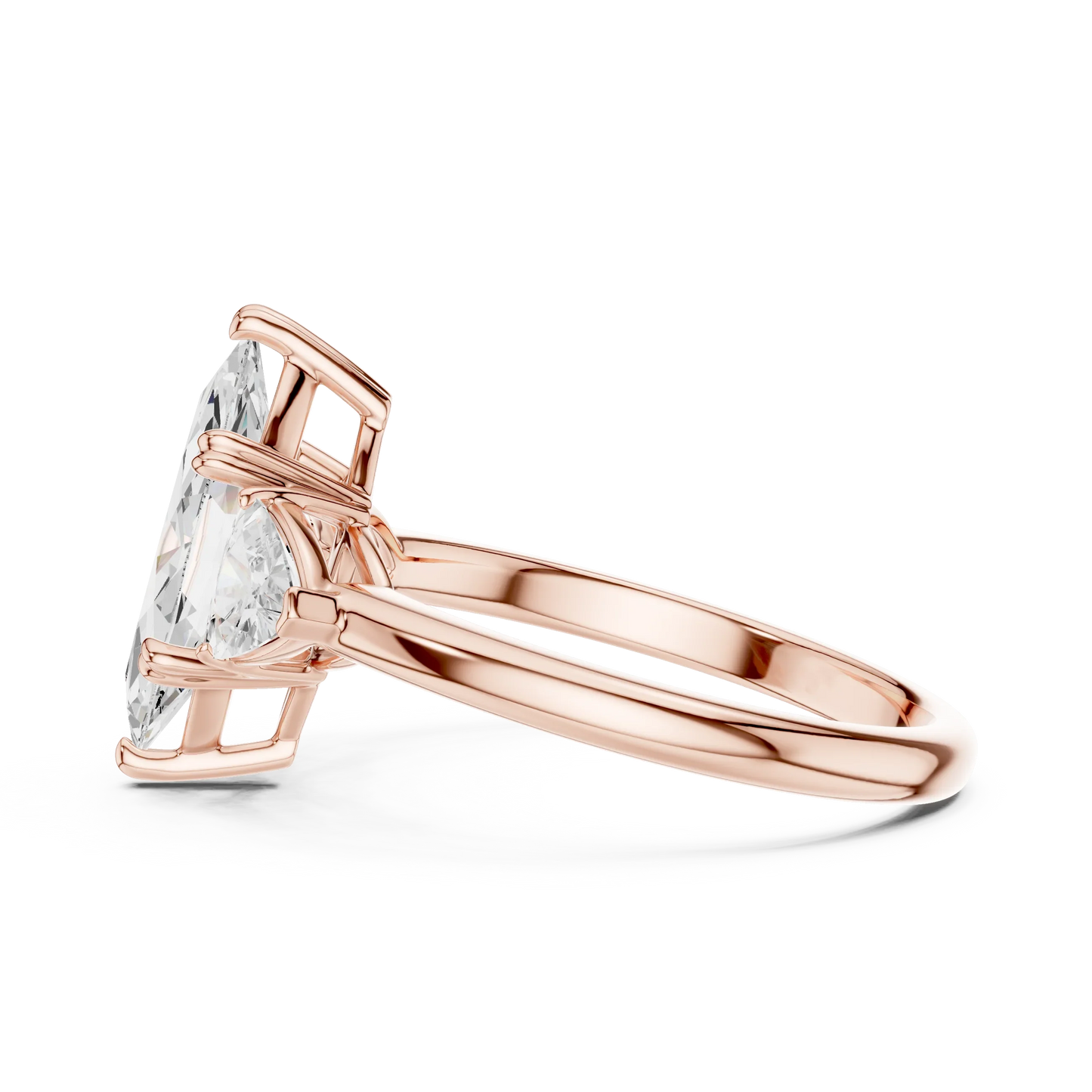 Side view of rose gold marquise three-stone ring with trillion cut side stones and lab-grown diamond 鈥?Australia