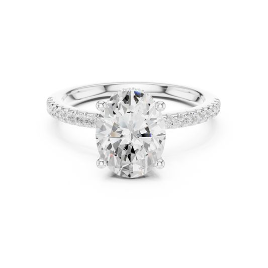 White gold oval cut solitaire ring with thin pave band and lab-grown diamond, delicate design