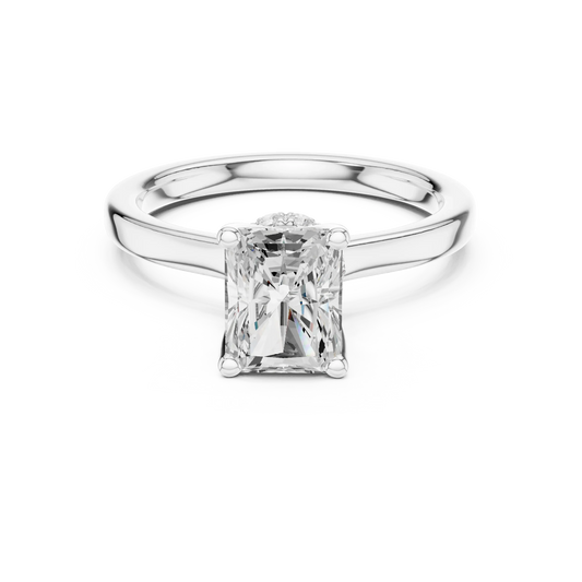 White gold radiant cut solitaire ring with hidden halo and domed band featuring lab-grown diamond, elegant design