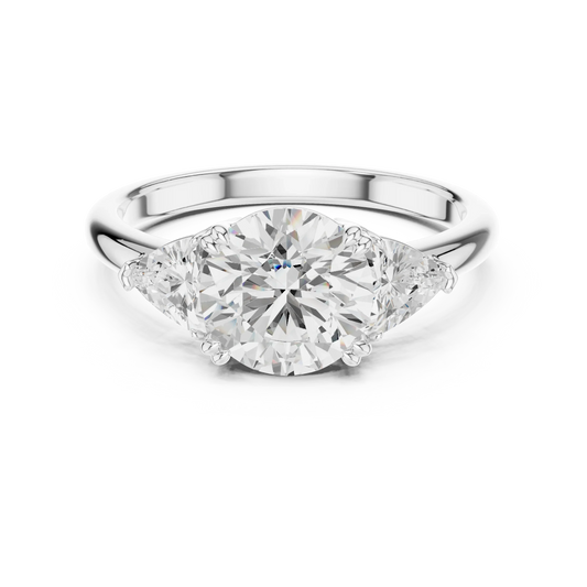 Rose gold round three-stone ring with trillion cut side stones and lab-grown diamond 鈥?Australia