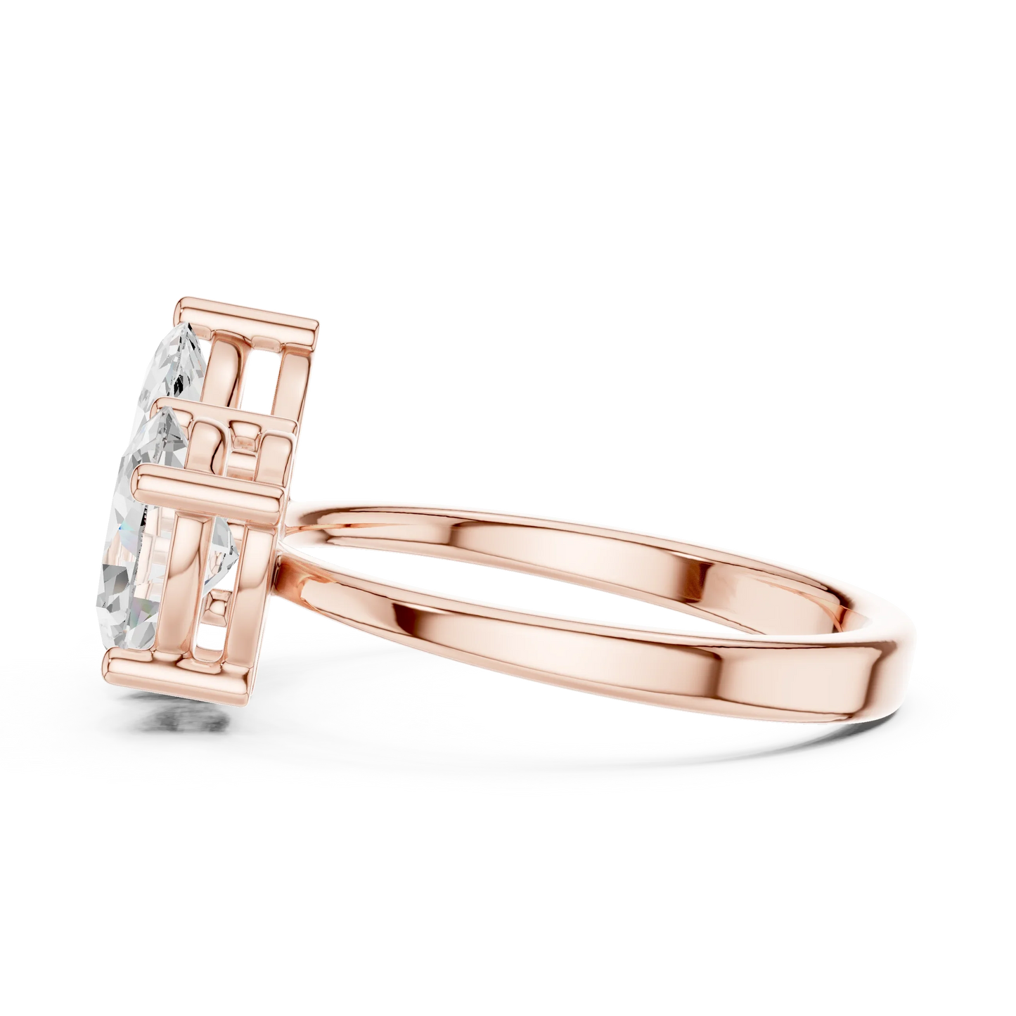 Side view of rose gold Toi et Moi ring highlighting marquise and oval diamond setting