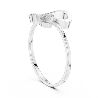Elegant white gold ring with modern ribbon-style design on black background