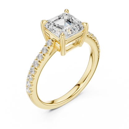 Front view of yellow gold Asscher diamond ring with pave band, emphasizing geometric cut