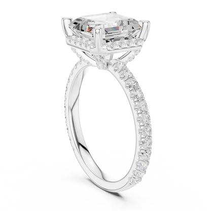 Back side view of white gold Asscher cut solitaire ring highlighting hidden halo and domed band details