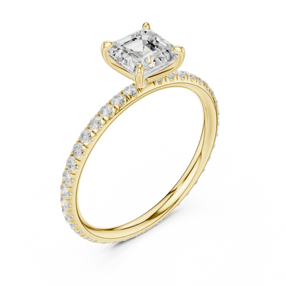 Front view of yellow gold Asscher cut solitaire ring with thin pavé diamond band and center gemstone