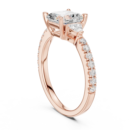 Back side view of rose gold Asscher three stone diamond pave ring, detailing band and setting.