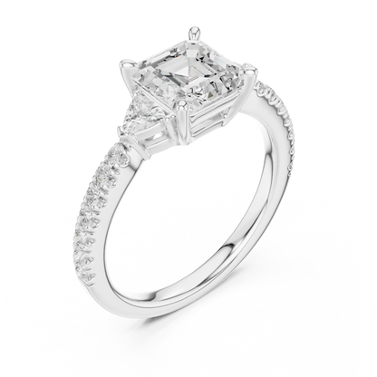 Front view of white gold Asscher cut three stone diamond pave ring, showcasing center and side stones.