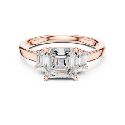 Lab-grown Asscher cut three stone diamond ring in rose gold, soft tone top view.