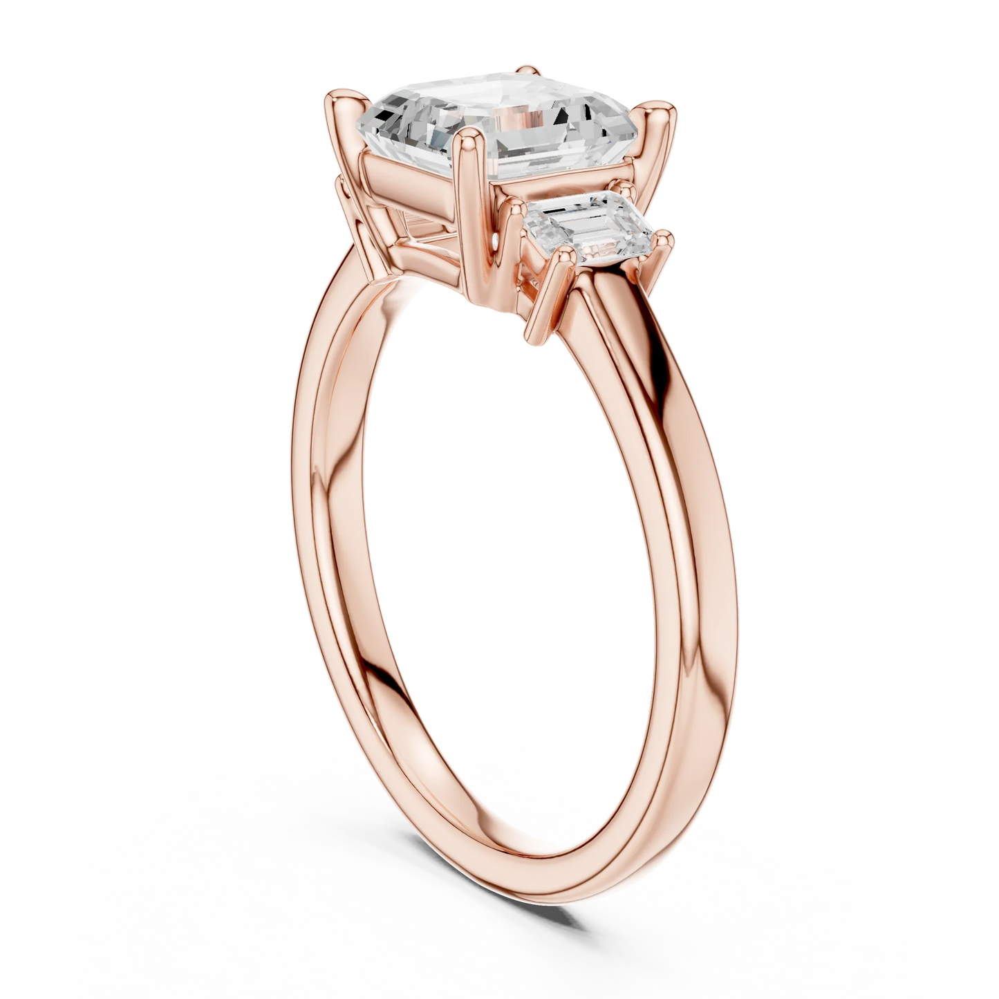 Back side view of rose gold Asscher three stone diamond ring, detailing band and setting.