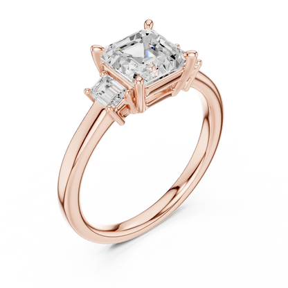 Front view of rose gold Asscher three stone diamond ring, showcasing gemstone brilliance
