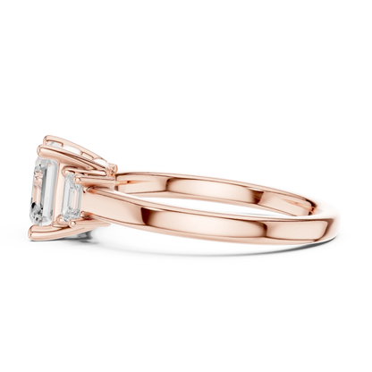 Side view of rose gold Asscher cut three stone diamond ring, highlighting design profile.