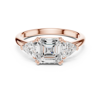Asscher three-stone ring in rose gold with trillion cut side stones and lab-grown diamond 鈥?Australia