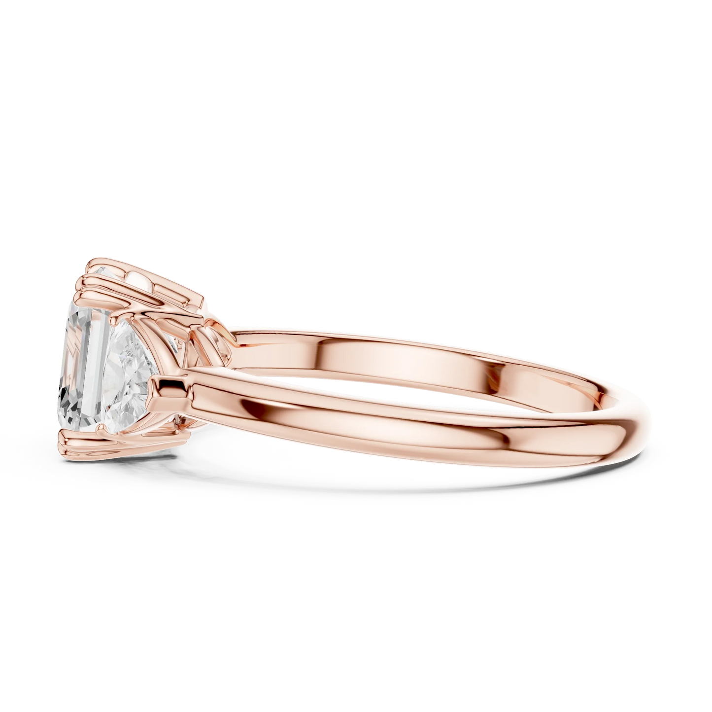 Side view of rose gold asscher three-stone ring with trillion cut side stones and lab-grown diamond 鈥?Australia