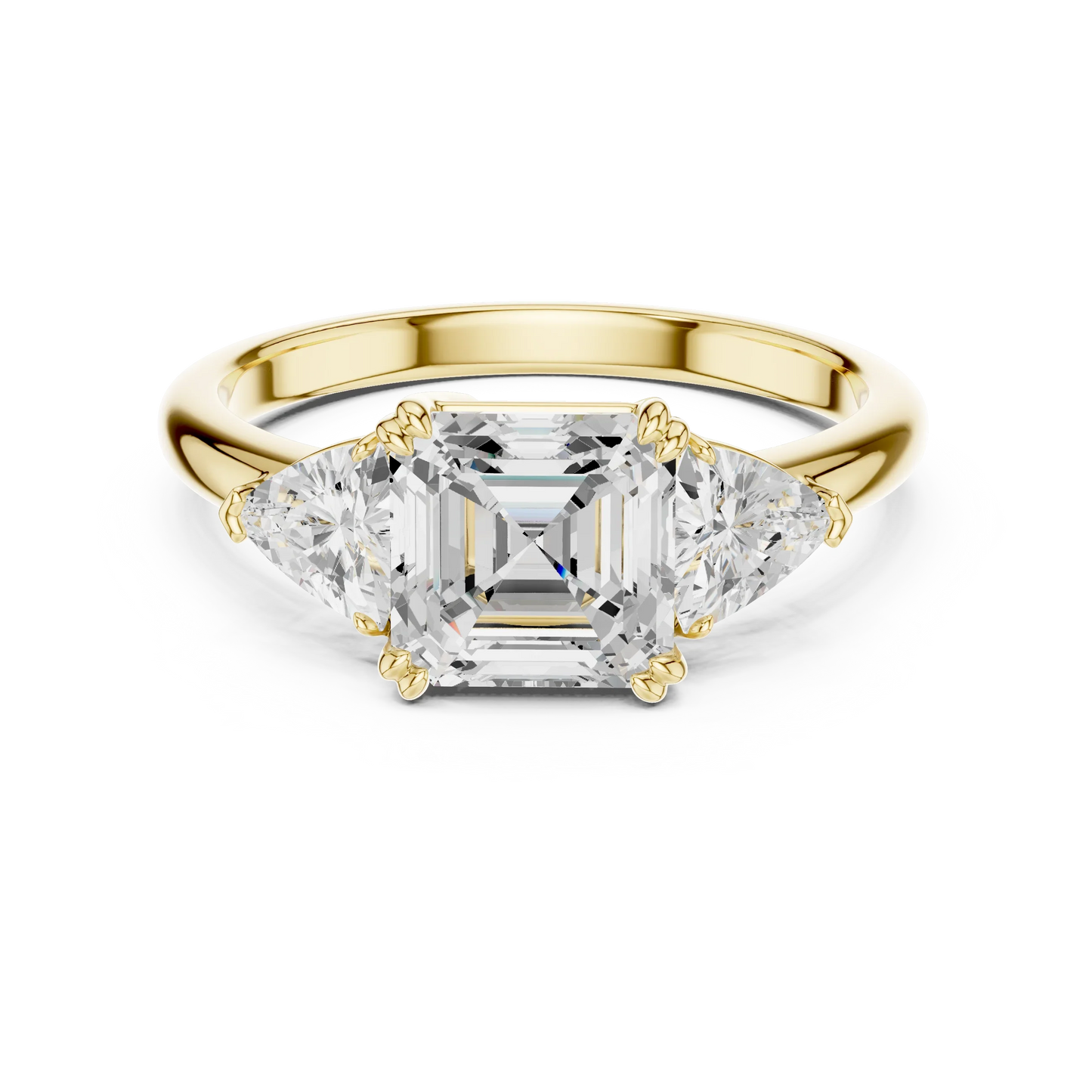 Asscher three-stone ring in yellow gold with trillion cut side stones and lab-grown diamond 鈥?Australia