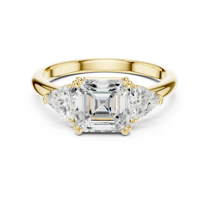Asscher three-stone ring in yellow gold with trillion cut side stones and lab-grown diamond 鈥?Australia