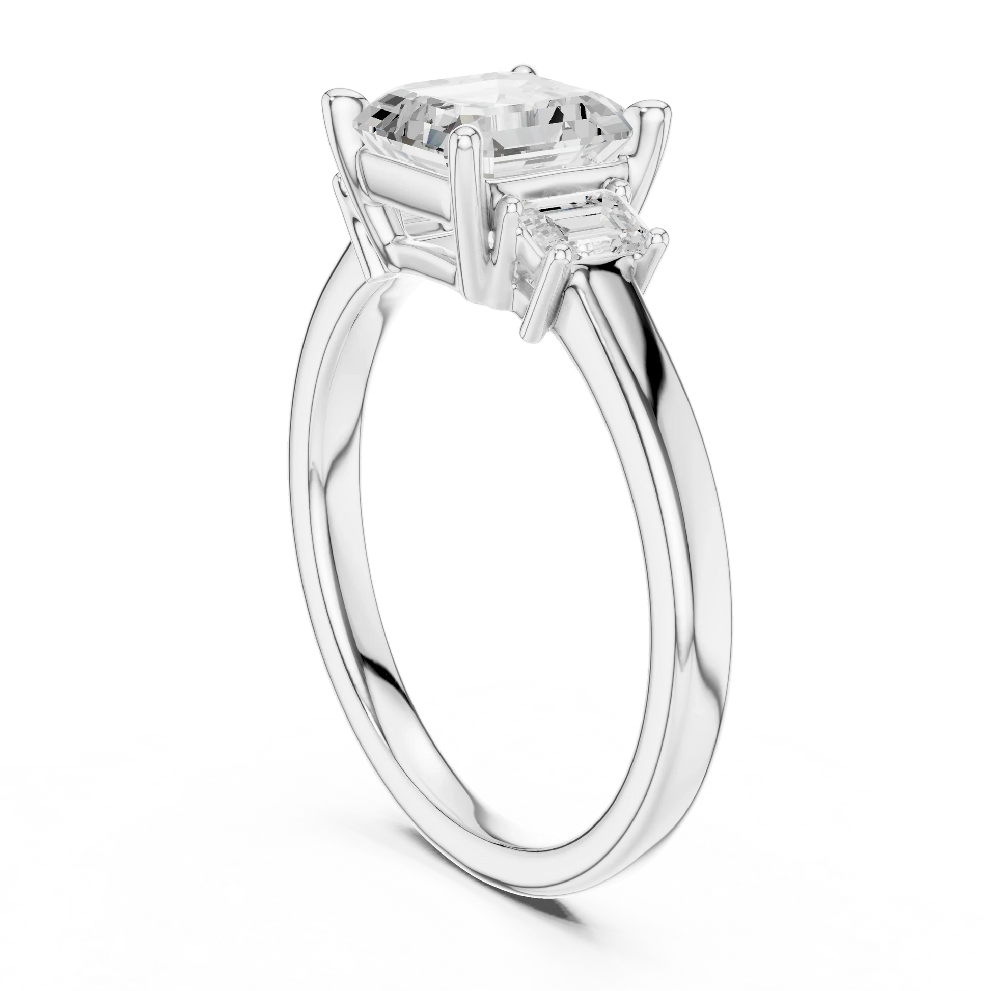 Back side view of white gold Asscher three stone diamond ring, showing band and setting