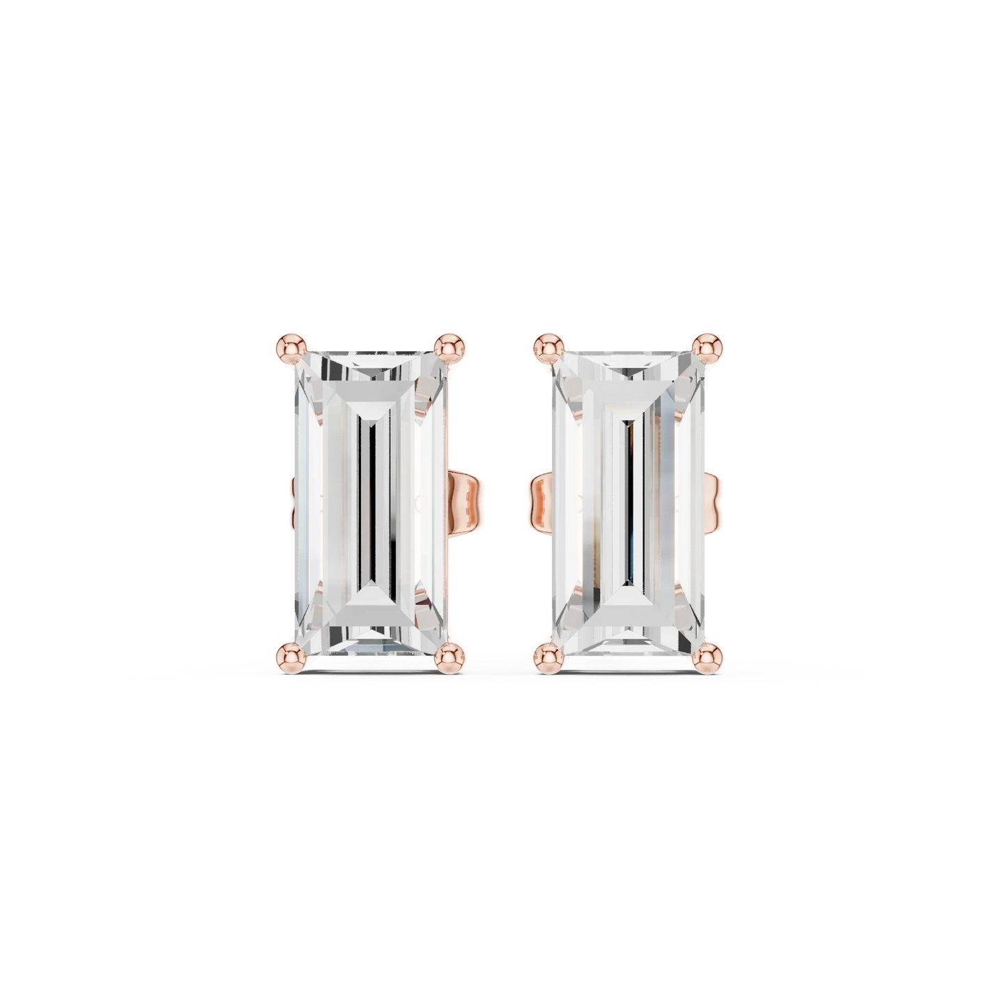 Pair of emerald-cut gemstone earrings with rose gold settings on a white background