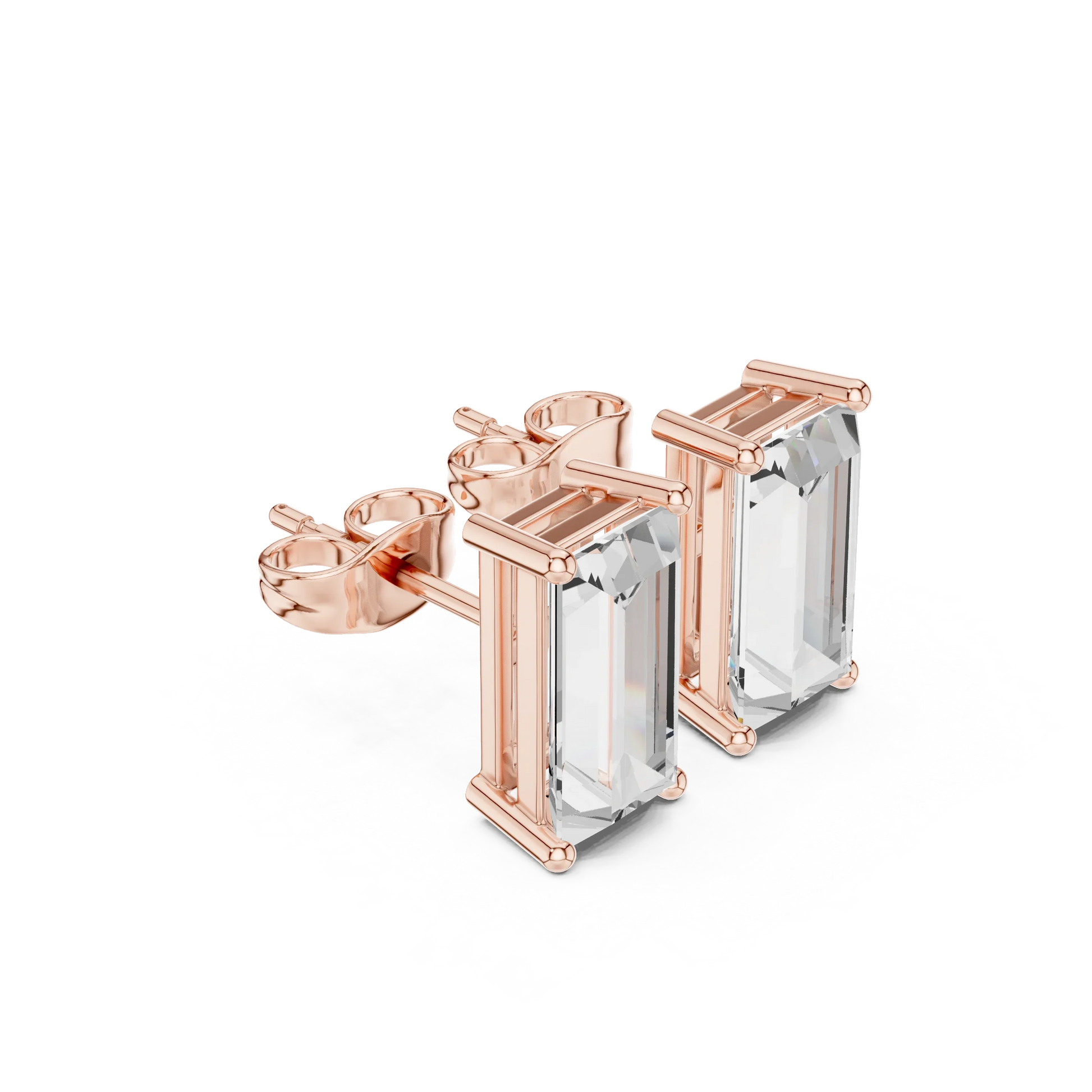 Rose gold earrings with clear gemstones on a white background
