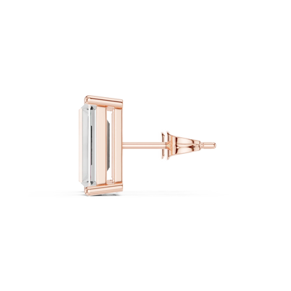 Rose gold and silver earring on a white background with side view