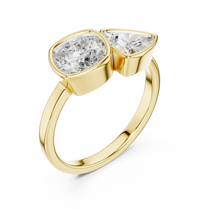 Bezel Toi et Moi yellow gold ring with cushion and trillion lab-grown diamonds front view
