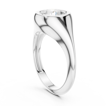 Back side view of white gold round bezel set signet ring, showing band and setting.