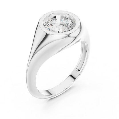 Front view of white gold round cut bezel set signet ring, showcasing center stone.
