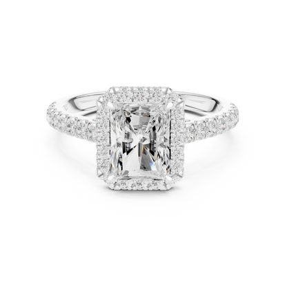 White gold brilliant halo radiant cut diamond ring with lab-grown center stone surrounded by sparkling halo diamonds, modern elegant design