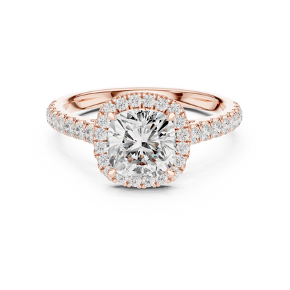 Front view of rose gold classic halo cushion cut diamond ring with lab-grown center stone surrounded by halo diamonds, romantic modern look