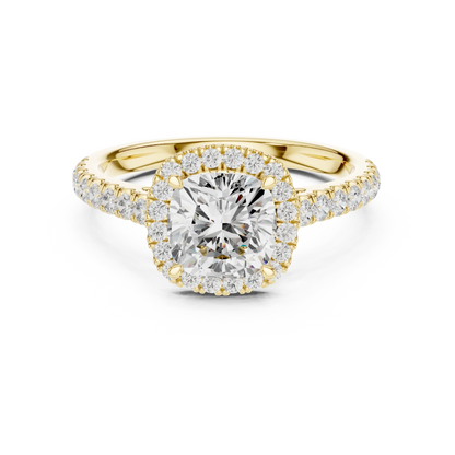 Front view of yellow gold classic halo cushion cut diamond ring with lab-grown center stone encircled by halo diamonds, timeless style