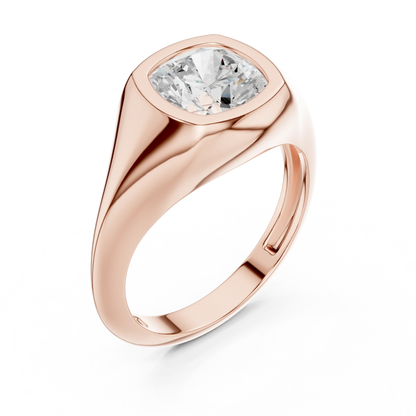 Front view of rose gold cushion cut bezel set signet style ring, showcasing gemstone brilliance.