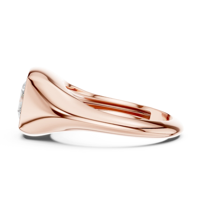 Side view of rose gold cushion cut bezel set signet style ring, highlighting overall design profile.
