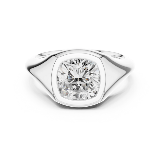 Lab-grown cushion cut bezel set signet style ring in white gold, elegant top view.