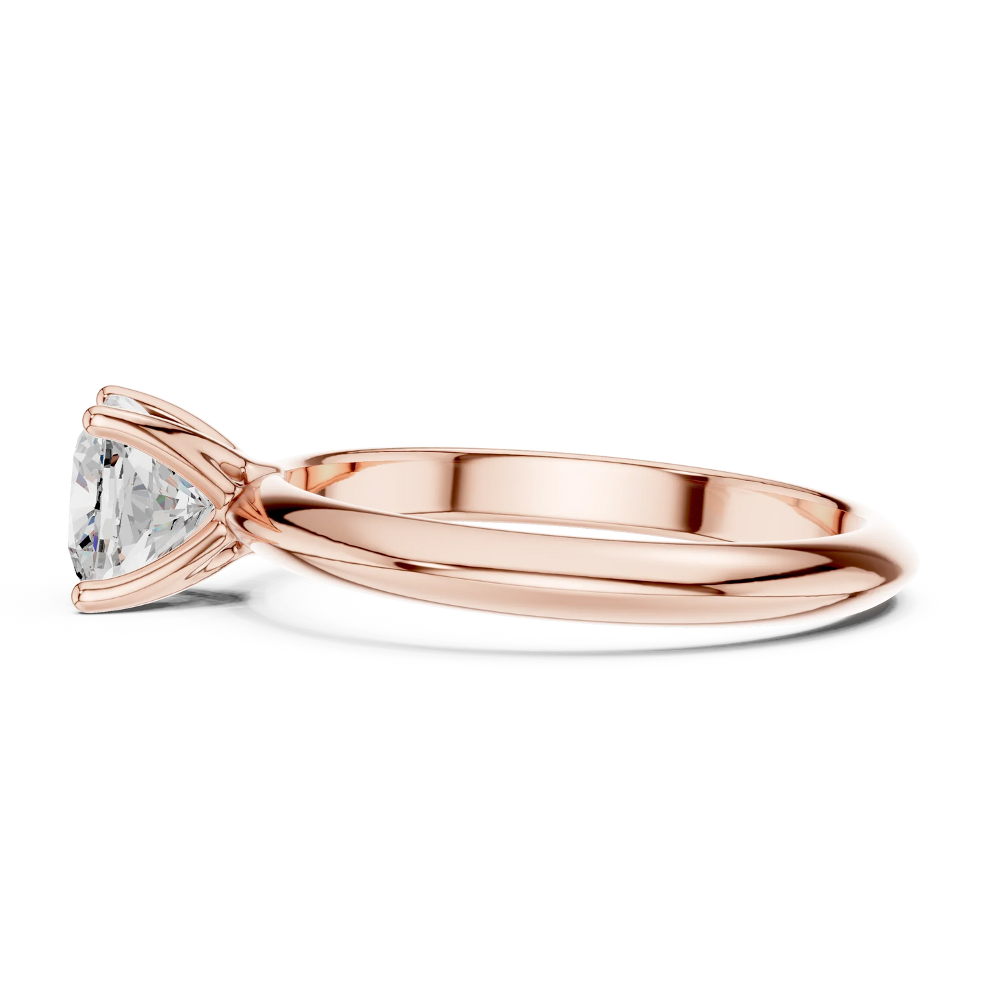 Side view of rose gold cushion cut diamond solitaire ring, highlighting design profile.