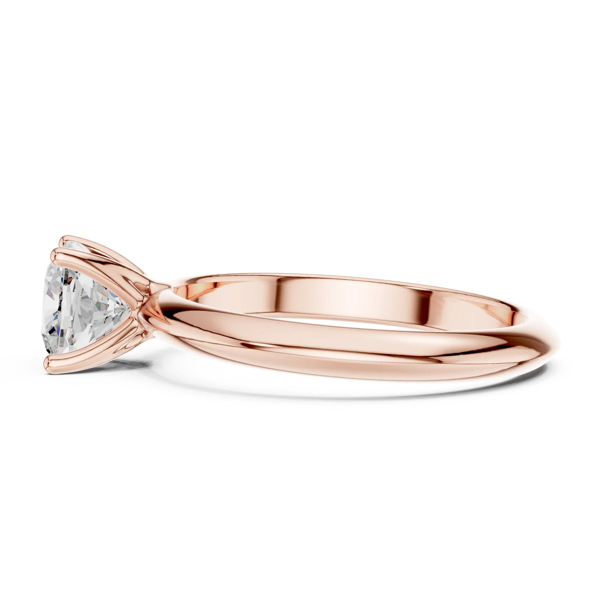 Side view of rose gold cushion cut diamond solitaire ring, highlighting design profile.