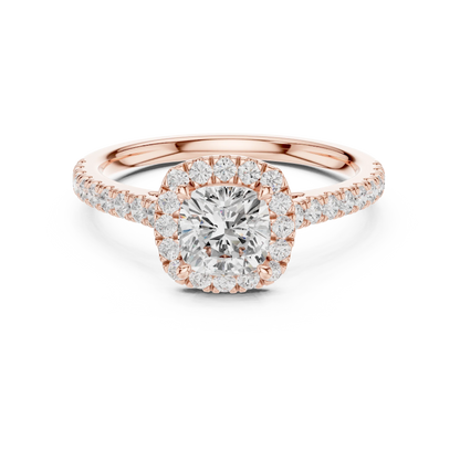 Rose gold cushion-cut halo ring with pav茅 diamond band and lab-grown center stone