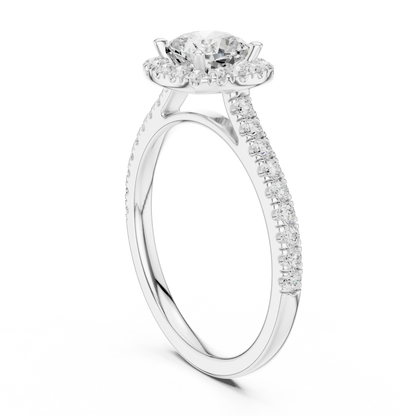 Top side view of white gold cushion-cut halo ring with pav茅 diamond band and lab-grown center stone