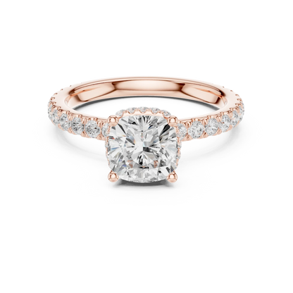 Cushion cut hidden halo ring with pave diamond band in rose gold with cushion lab diamond
