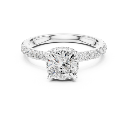 Cushion cut hidden halo ring with pave diamond band in white gold with cushion lab diamond.