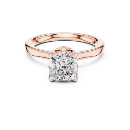 Rose gold cushion cut solitaire ring with hidden halo and domed band featuring lab-grown diamond, modern look