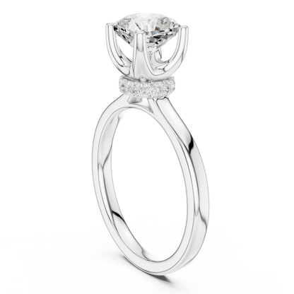 Back view of white gold cushion cut solitaire ring showing hidden halo and domed band details