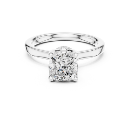 White gold cushion cut solitaire ring with hidden halo and domed band featuring lab-grown diamond, elegant design