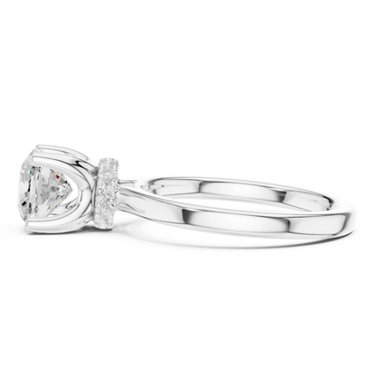 Side view of white gold cushion cut solitaire ring highlighting hidden halo and domed band design