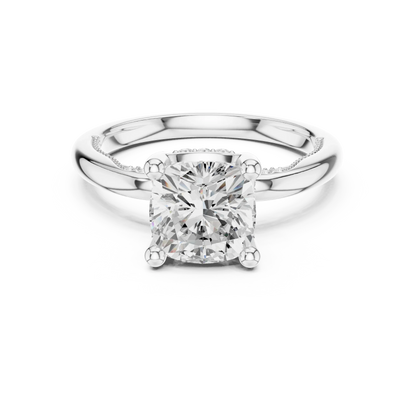 White gold cushion cut solitaire ring with hidden halo and domed band featuring lab-grown diamond, elegant design