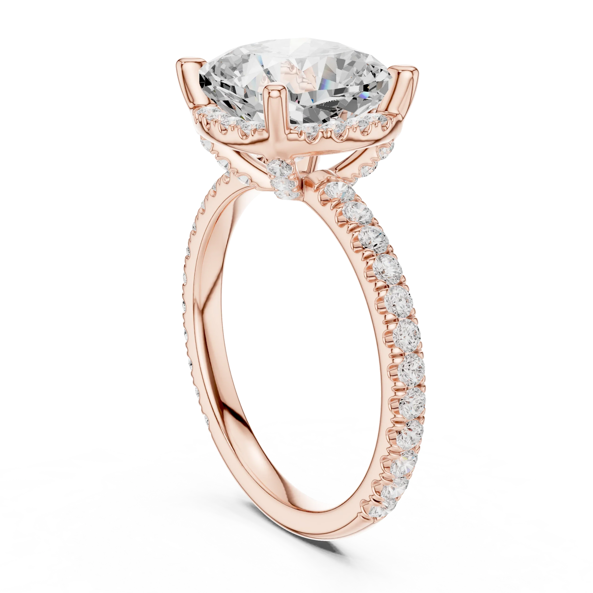 Back side view of rose gold cushion cut solitaire ring showing hidden halo and thin pav茅 band details