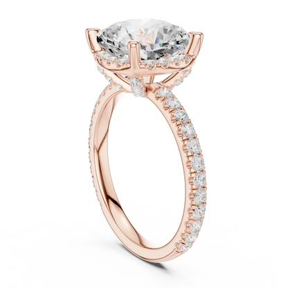Back side view of rose gold cushion cut solitaire ring showing hidden halo and thin pav茅 band details
