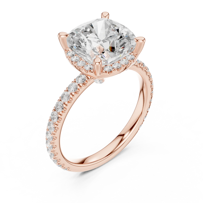 Front view of rose gold cushion cut solitaire ring with hidden halo and thin pav茅 diamond band and lab-created diamond