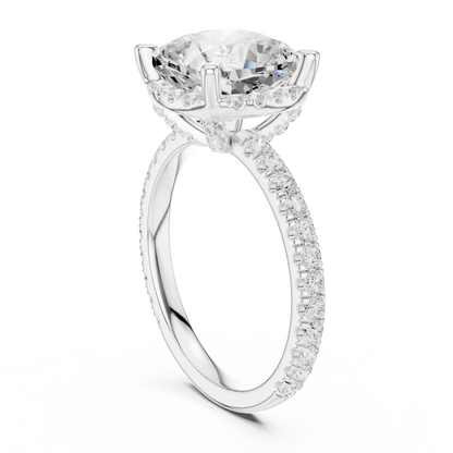 Back side view of white gold cushion cut solitaire ring showing hidden halo and thin pav茅 band details