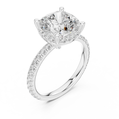Front view of white gold cushion cut solitaire ring with hidden halo and thin pav茅 diamond band and lab-created diamond